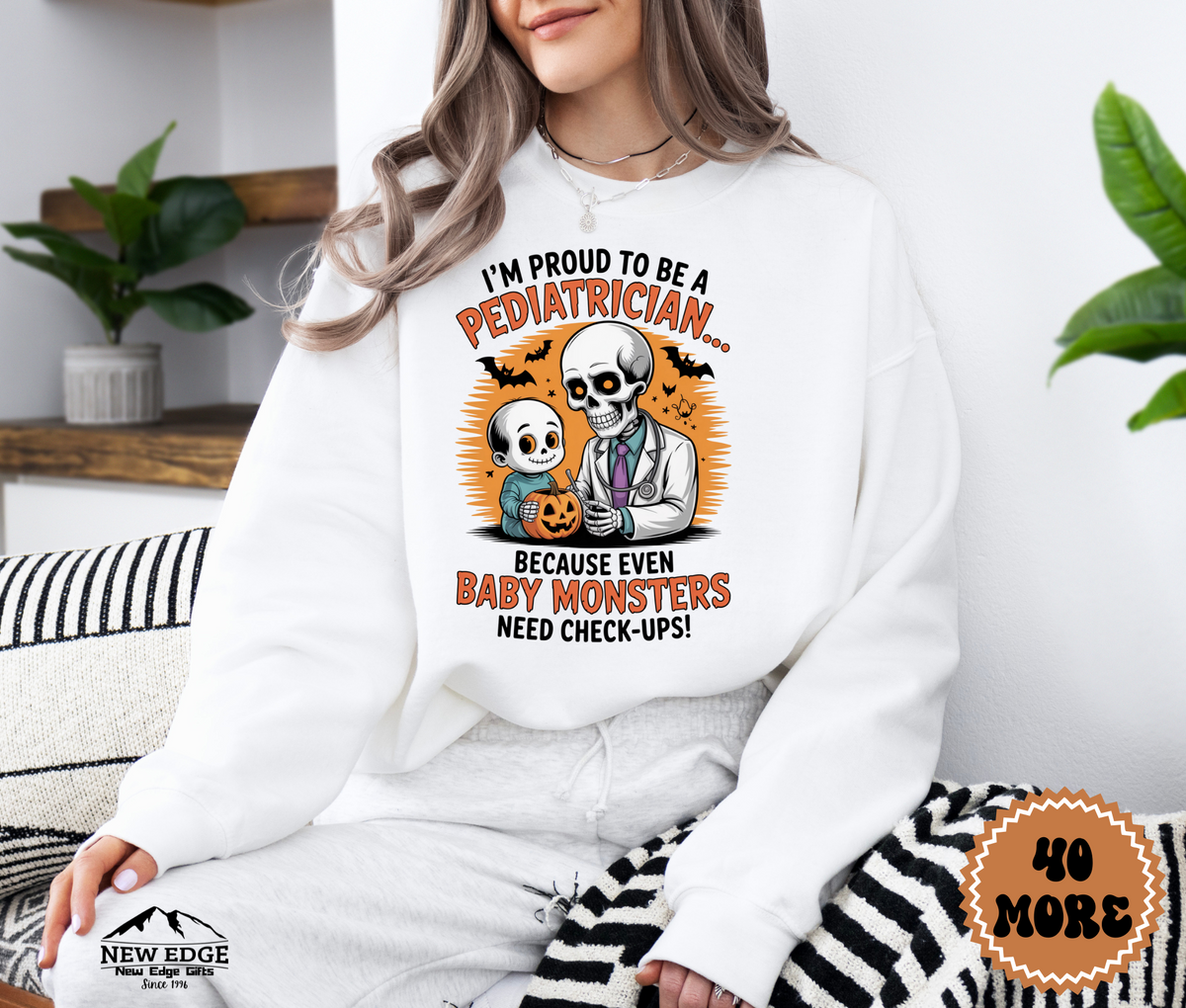 Unisex Halloween Pediatrician Sweatshirt – “I’m Proud to be a Pediatrician… Because Even Baby Monsters Need Check-Ups” Funny Profession Crewneck