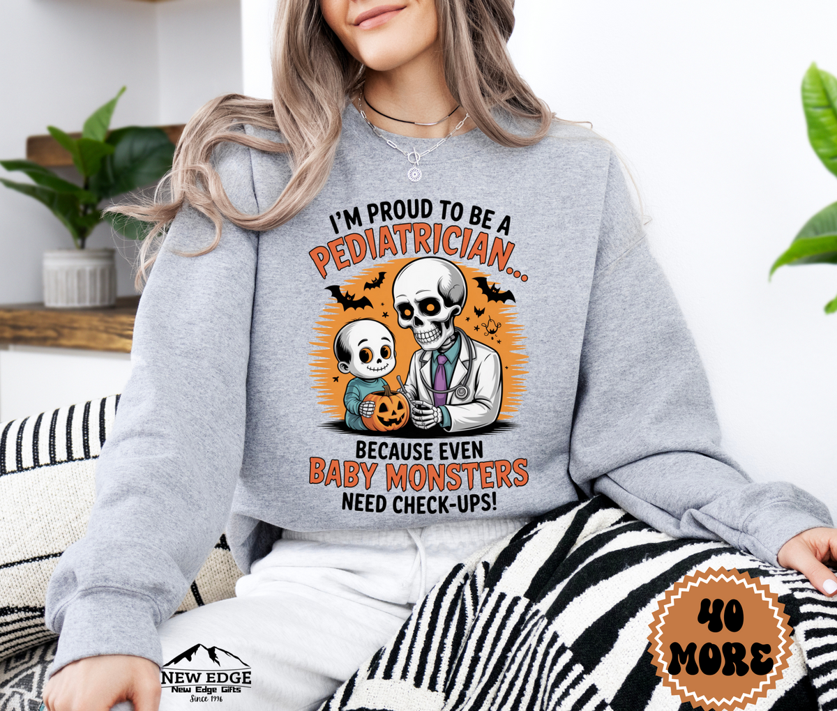 Unisex Halloween Pediatrician Sweatshirt – “I’m Proud to be a Pediatrician… Because Even Baby Monsters Need Check-Ups” Funny Profession Crewneck